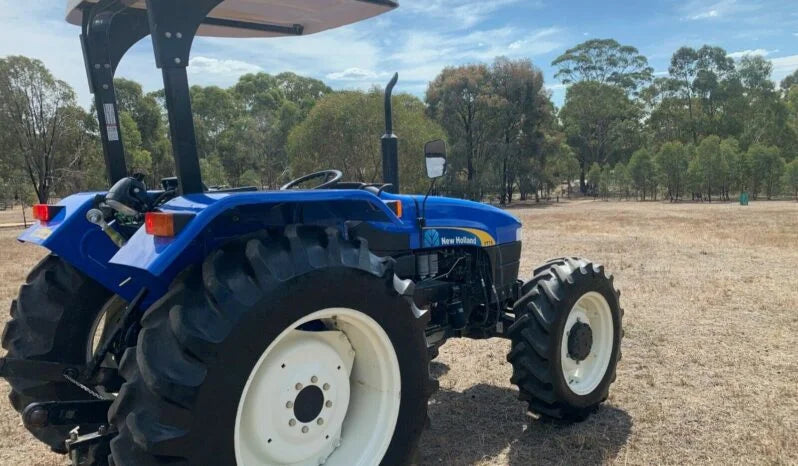 Tracteur New Holland TT75 – 75 CV – 4x4, Blocage, 914 h – Robuste et Polyvalent