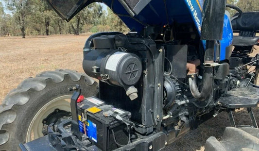 Tracteur New Holland TT75 – 75 CV – 4x4, Blocage, 914 h – Robuste et Polyvalent