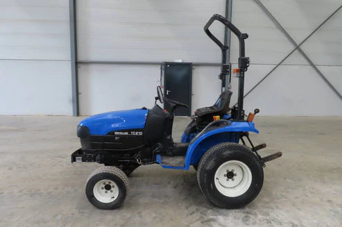 Tracteur compact New Holland TC 21 D – 4x4 – Transmission hydrostatique