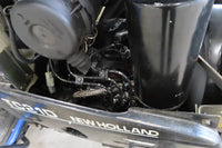Tracteur compact New Holland TC 21 D – 4x4 – Transmission hydrostatique